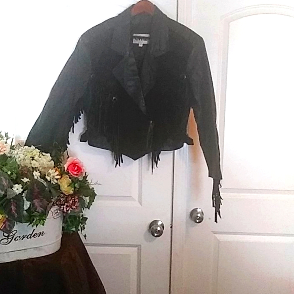 CHIA biker jacket with fringes. (115)